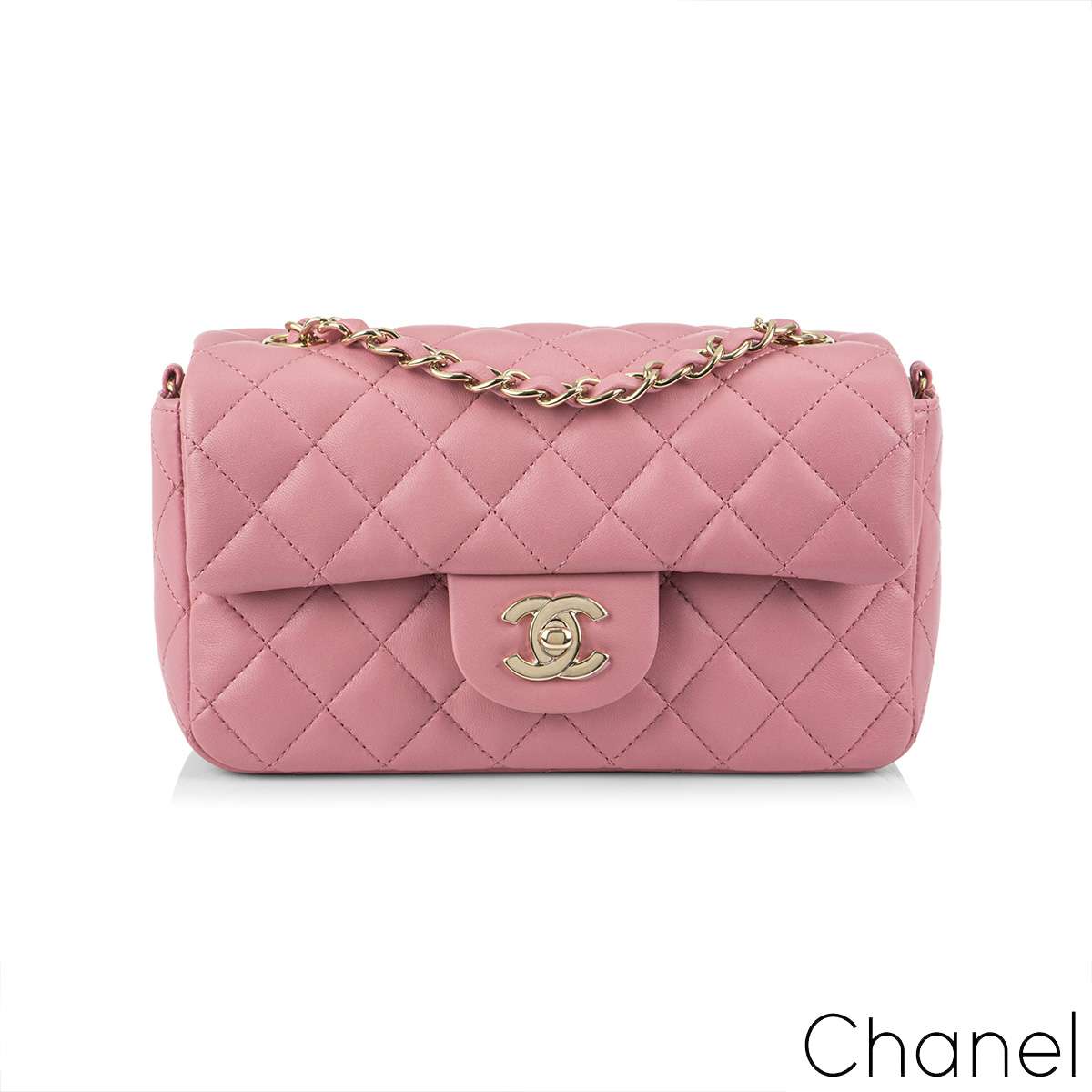 Vintage CHANEL quilted pink lamb leather backpack with golden